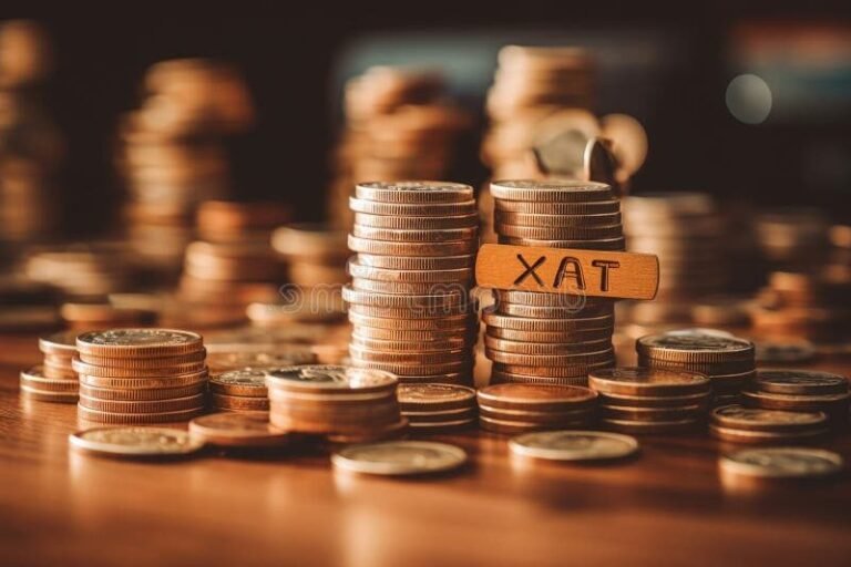 livre et pieces de monnaie symbolisant fiscalite