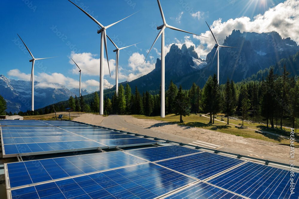 Quelle est la Fiabilité de l'Offre Verte Fixe de Total Énergie 1 panneaux solaires et eoliennes en paysage naturel
